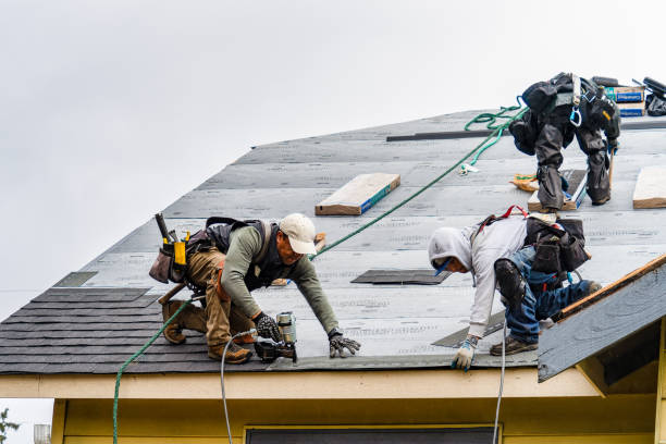 Professional Gutter Installation technician working in Brick, NJ